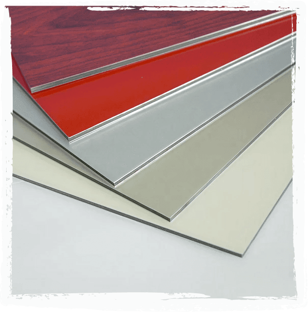 A fanned arrangement of HPL laminate panel samples in different colours and finishes, including a red glossy panel and a wood-grain panel.