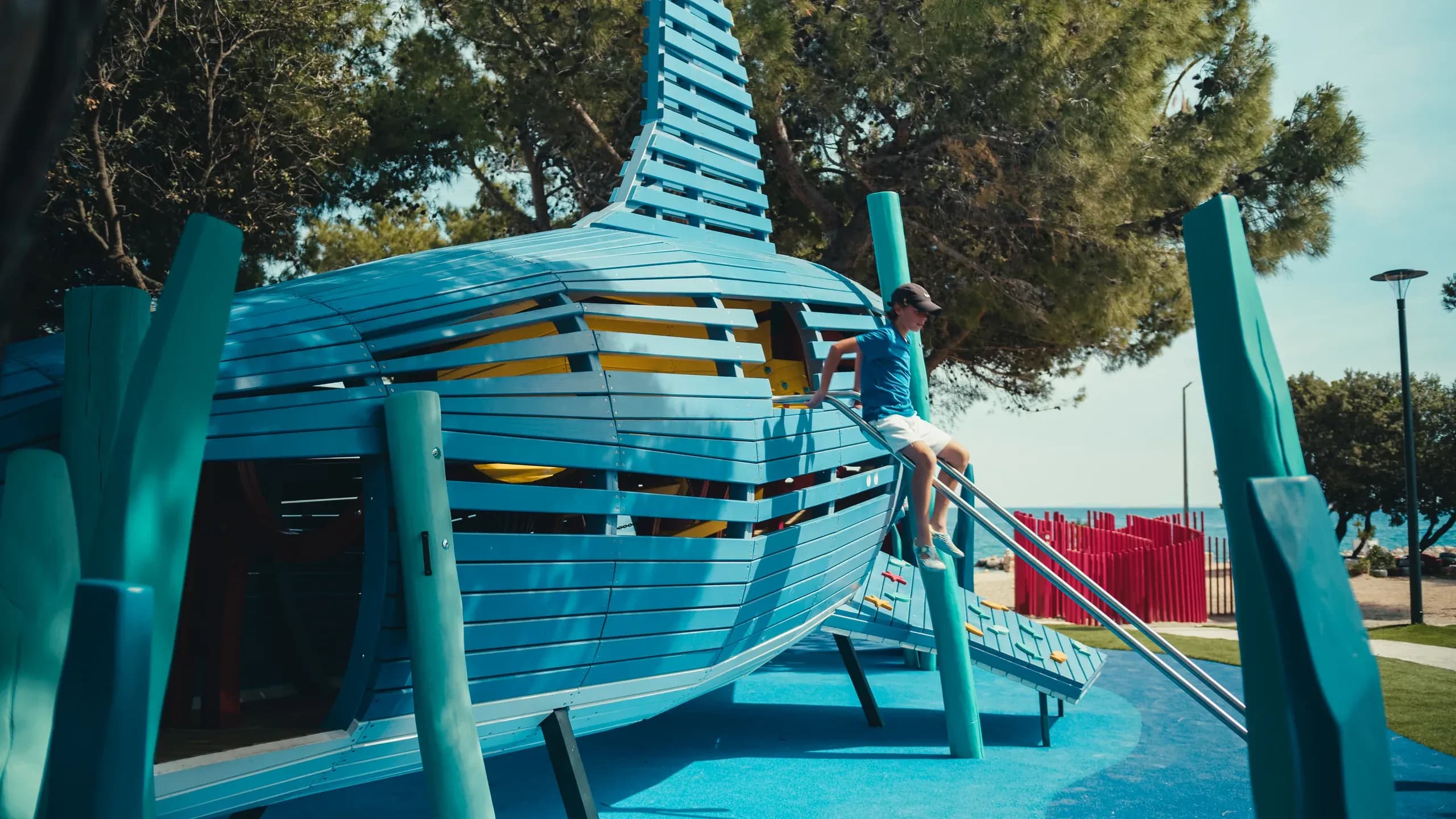 Front view of the shark structure at Sea World, showing the jaw entrance and porthole window.