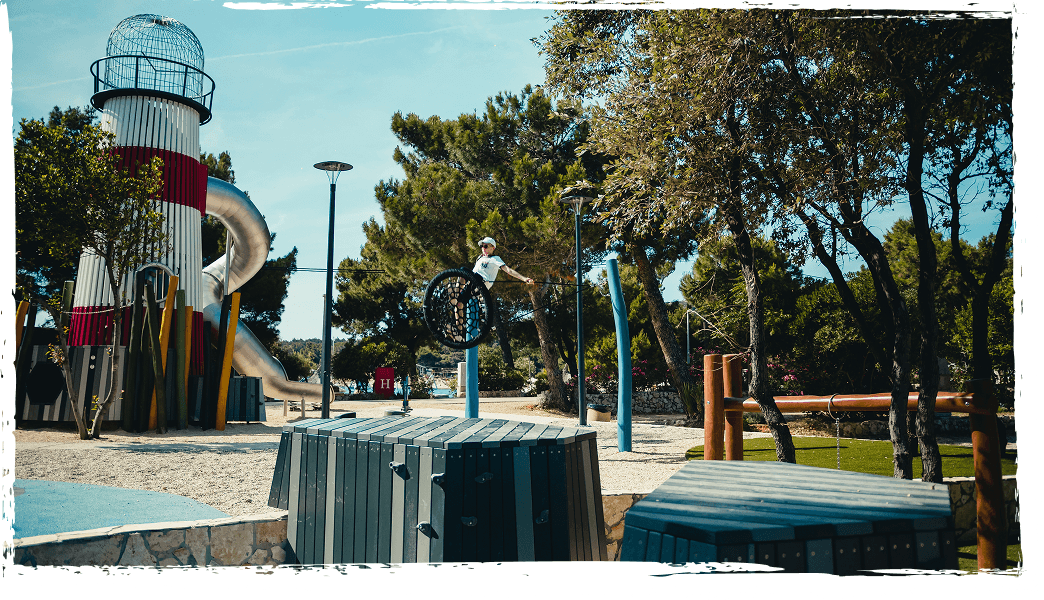 The full Sea World playground site at Kamp Šimuni at golden hour.