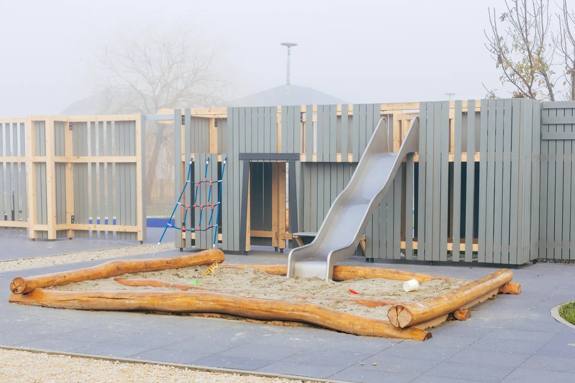 The sandpit and slide of the Discovery Zone at Timeless Legends, built for the youngest children.